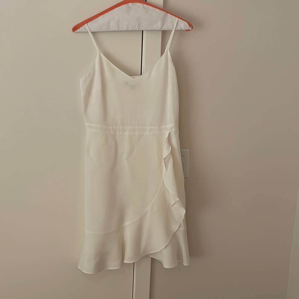 Creame Banana Republic dress with wrap tie at waist. Size 6, worn once.